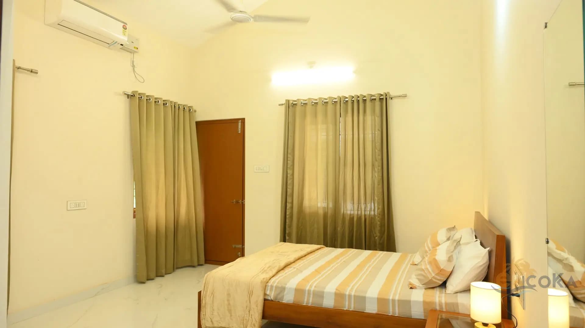 Air-conditioned bedroom with warm lighting